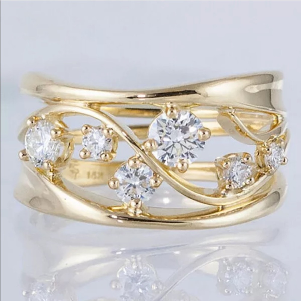 14kt Gold plated Zircon ring can be used as a wedding or cocktail ring. Yell…